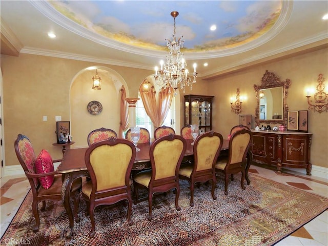 tiled dining room with baseboards, ornamental molding, a tray ceiling, a chandelier, and recessed lighting