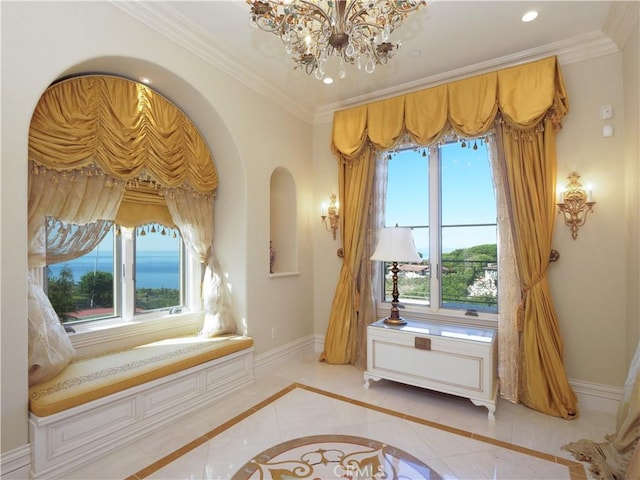 sitting room featuring arched walkways, recessed lighting, a notable chandelier, baseboards, and crown molding