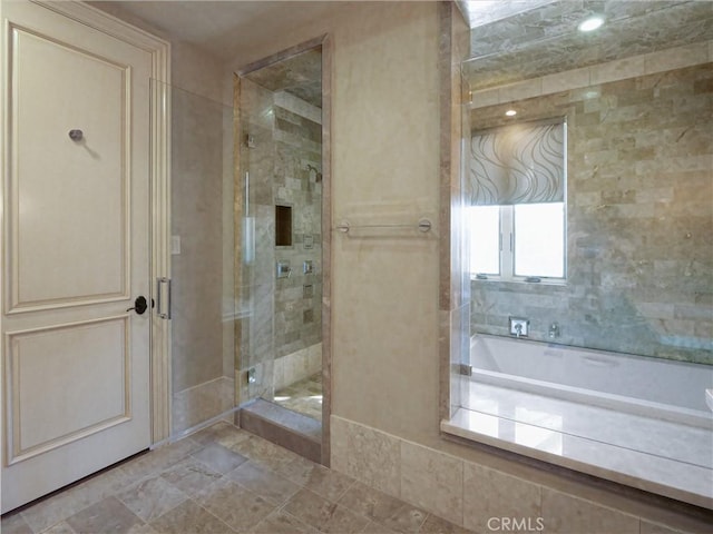 full bathroom featuring a stall shower