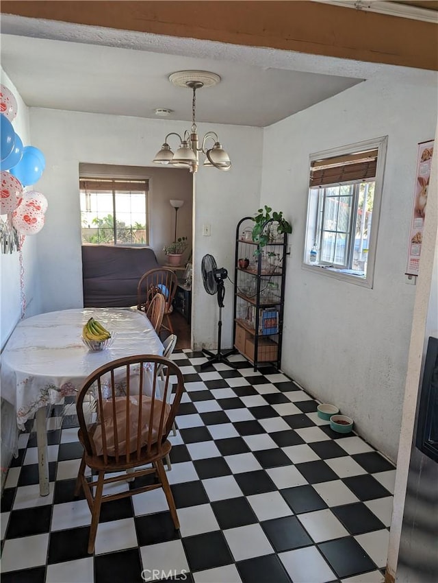 dining room featuring a notable chandelier