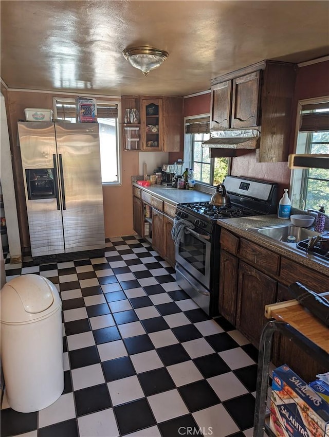 kitchen with sink and appliances with stainless steel finishes