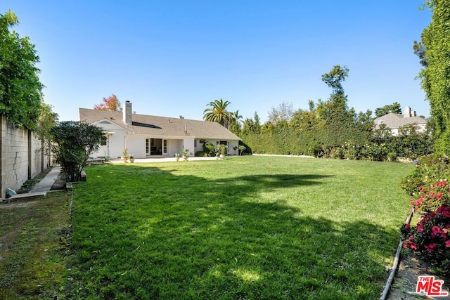 view of yard with a patio area