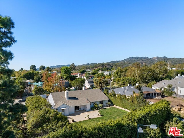 drone / aerial view featuring a mountain view