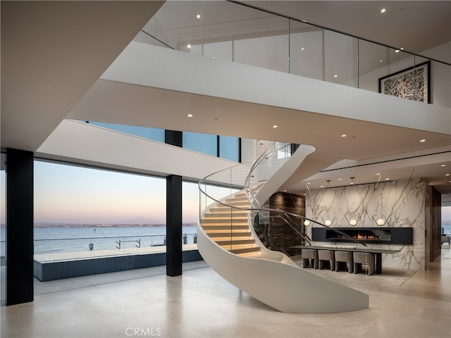 building lobby featuring a water view