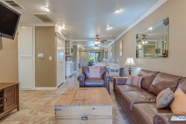 living room featuring crown molding