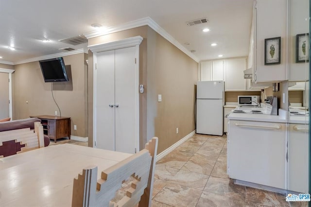 kitchen featuring white appliances, ventilation hood, white cabinetry, and ornamental molding