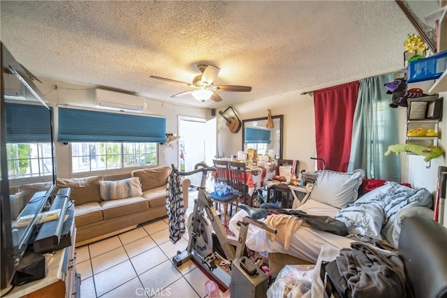 5965 W Blvd, Los Angeles, CA 90043 - tiled living room featuring a wall mounted air conditioner, a textured ceiling, and ceiling fan