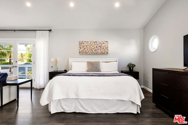 bedroom featuring access to outside, dark hardwood / wood-style floors, and french doors