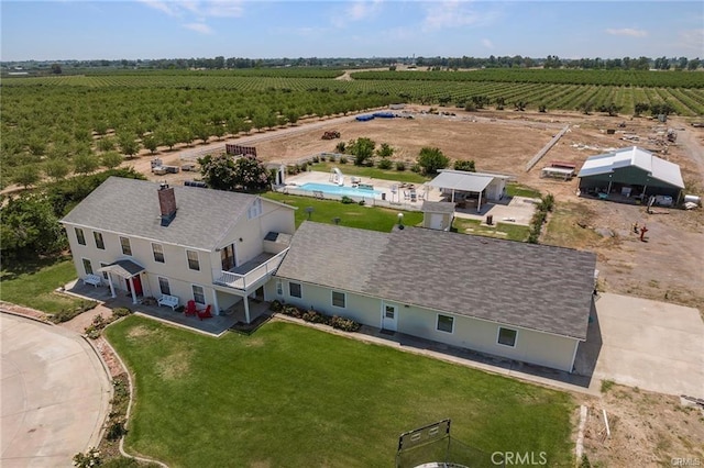 birds eye view of property featuring a rural view