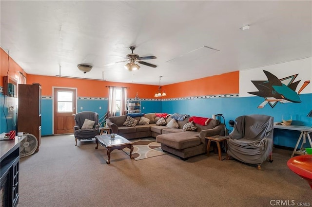 living room with carpet flooring and ceiling fan