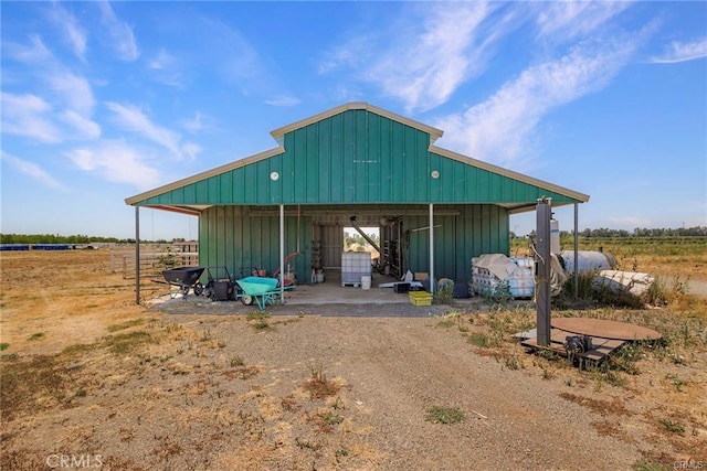 view of outdoor structure with a rural view