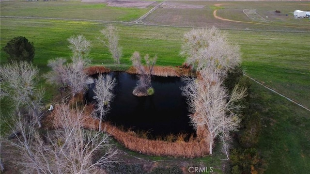 aerial view featuring a rural view and a water view