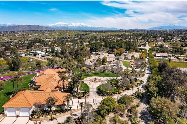 drone / aerial view featuring a mountain view