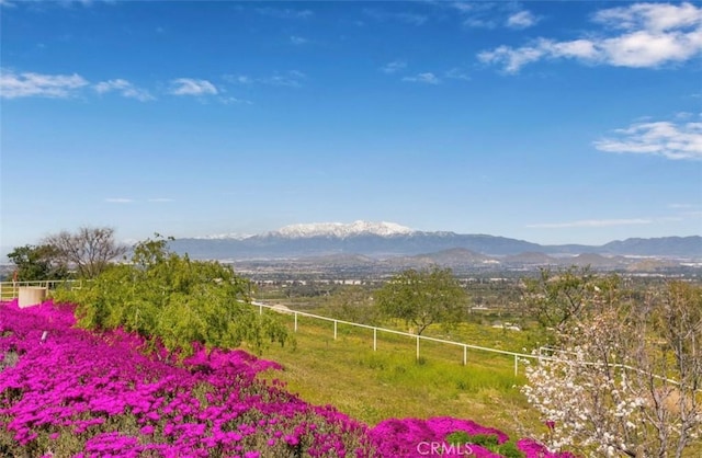 view of mountain feature with a rural view