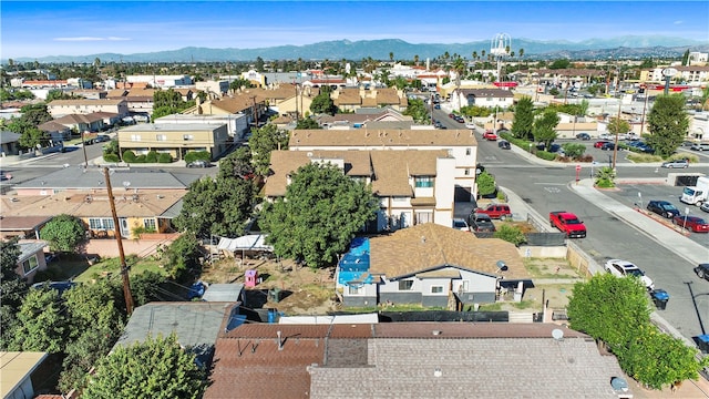 drone / aerial view featuring a mountain view