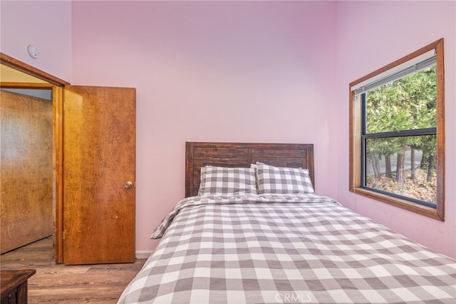 bedroom featuring light wood-type flooring