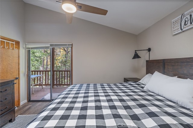 bedroom featuring lofted ceiling, dark hardwood / wood-style floors, access to outside, and ceiling fan