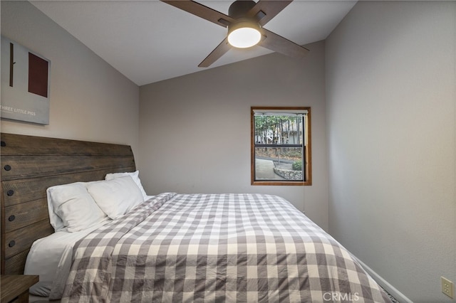 bedroom with lofted ceiling and ceiling fan