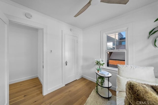 1000 The Strand, Manhattan Beach, CA 90266 - sitting room with wood finished floors, a ceiling fan, baseboards, and ornamental molding