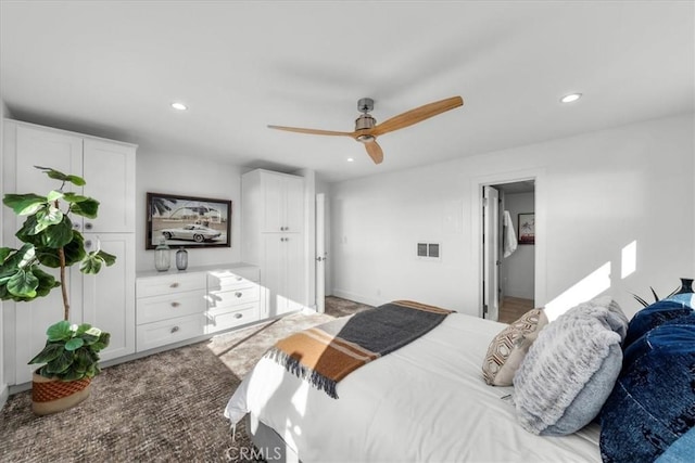 carpeted bedroom with ceiling fan