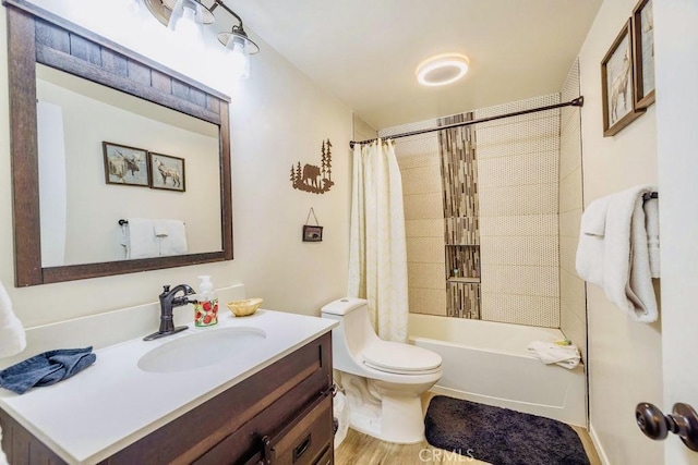 full bathroom featuring toilet, vanity, and shower / tub combo with curtain