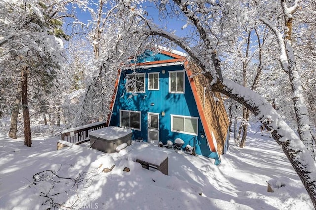 view of snow covered property