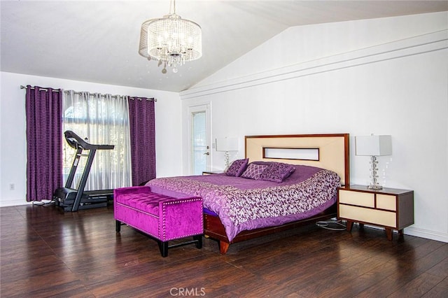 bedroom featuring hardwood / wood-style flooring, vaulted ceiling, and a notable chandelier