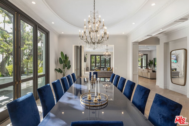 dining area with ornamental molding and light parquet flooring