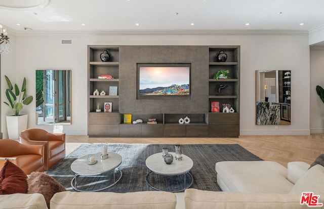 living room featuring ornamental molding, light parquet floors, and built in features