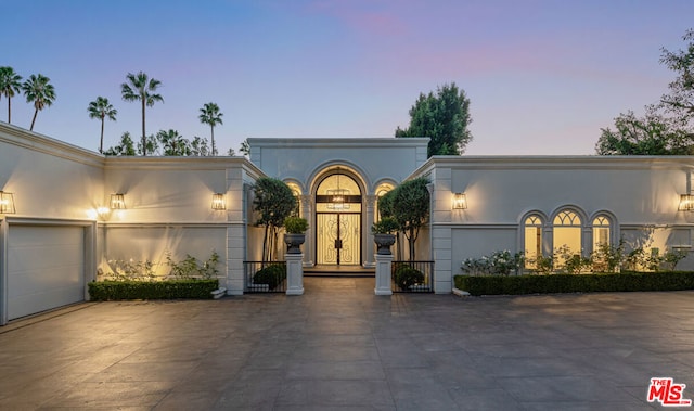 view of front of house with a garage