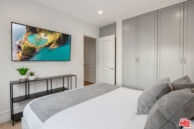 bedroom featuring light wood-type flooring