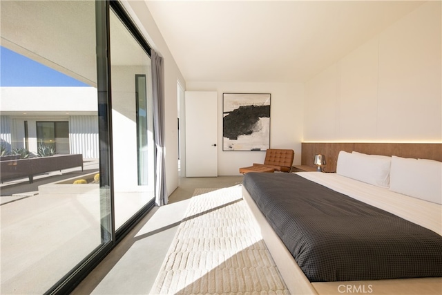 bedroom featuring light carpet