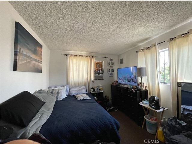 bedroom featuring a textured ceiling