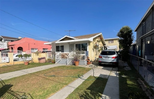 view of front of property with a front lawn and a porch