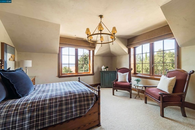 bedroom with an inviting chandelier, lofted ceiling, multiple windows, and carpet