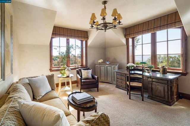 interior space featuring a notable chandelier, a healthy amount of sunlight, and light colored carpet