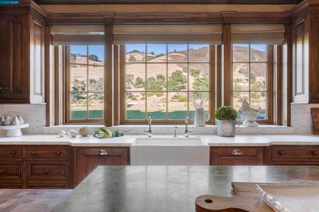 bathroom featuring tasteful backsplash and vanity