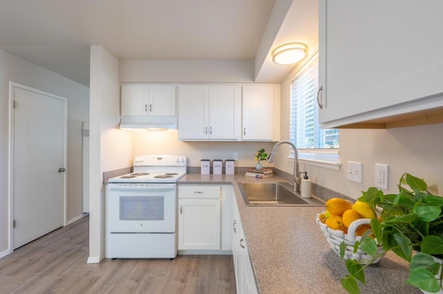 kitchen featuring light hardwood / wood-style floors, white electric range oven, white cabinetry, and sink