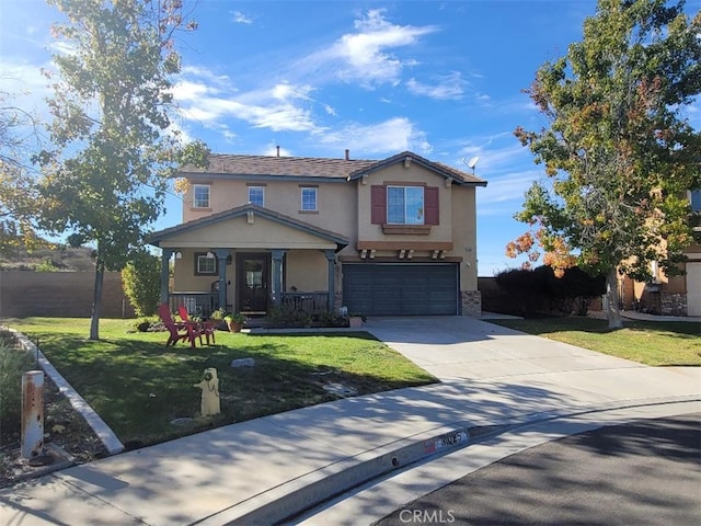 view of front of home with a front lawn and a garage