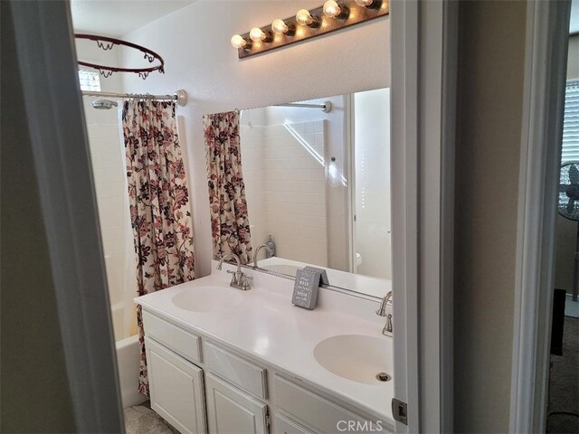 bathroom with vanity and shower / tub combo