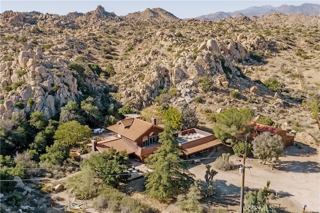 drone / aerial view featuring a mountain view