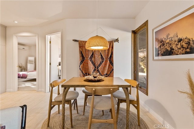 dining area with light tile patterned floors