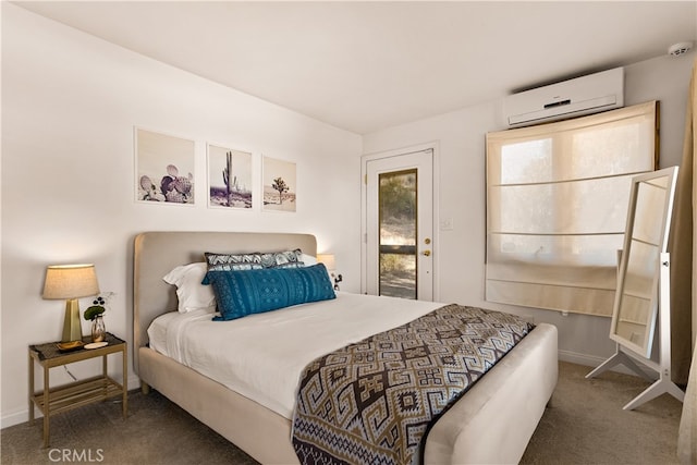 bedroom featuring a wall unit AC, access to exterior, and carpet flooring