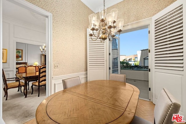 carpeted dining area with ornamental molding, an inviting chandelier, and radiator heating unit