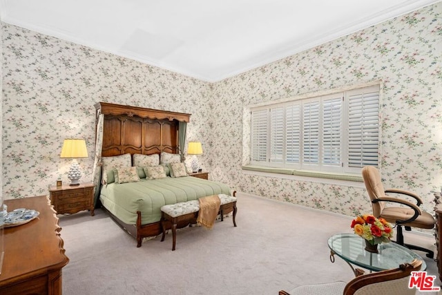 carpeted bedroom featuring crown molding