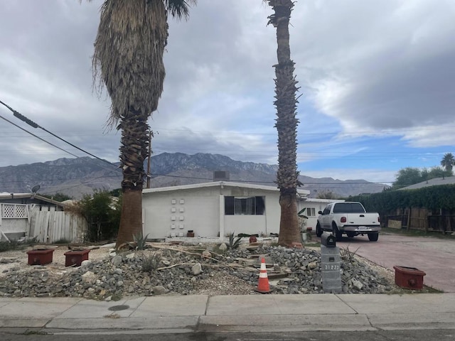 view of front of home with a mountain view