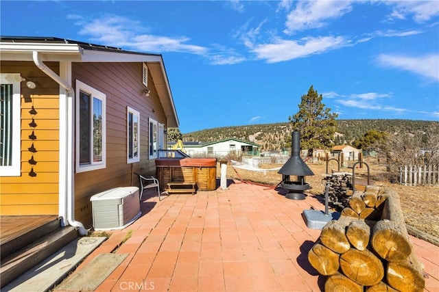 view of patio featuring a hot tub