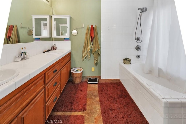 bathroom with tile patterned floors, vanity, and shower / tub combo