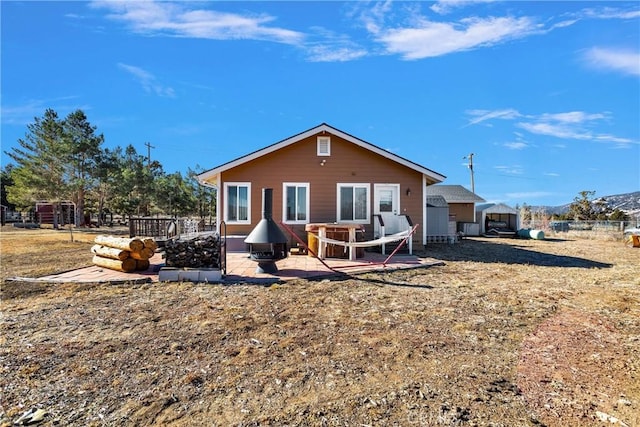 back of property featuring a patio area