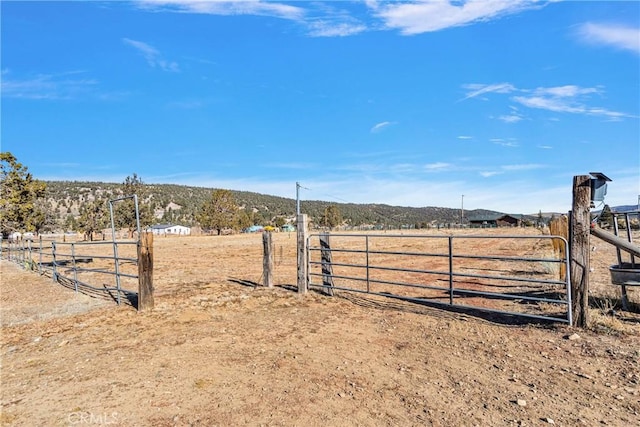 view of gate featuring a rural view